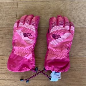 Pair of girls, pink large North Face Dryvent gloves.